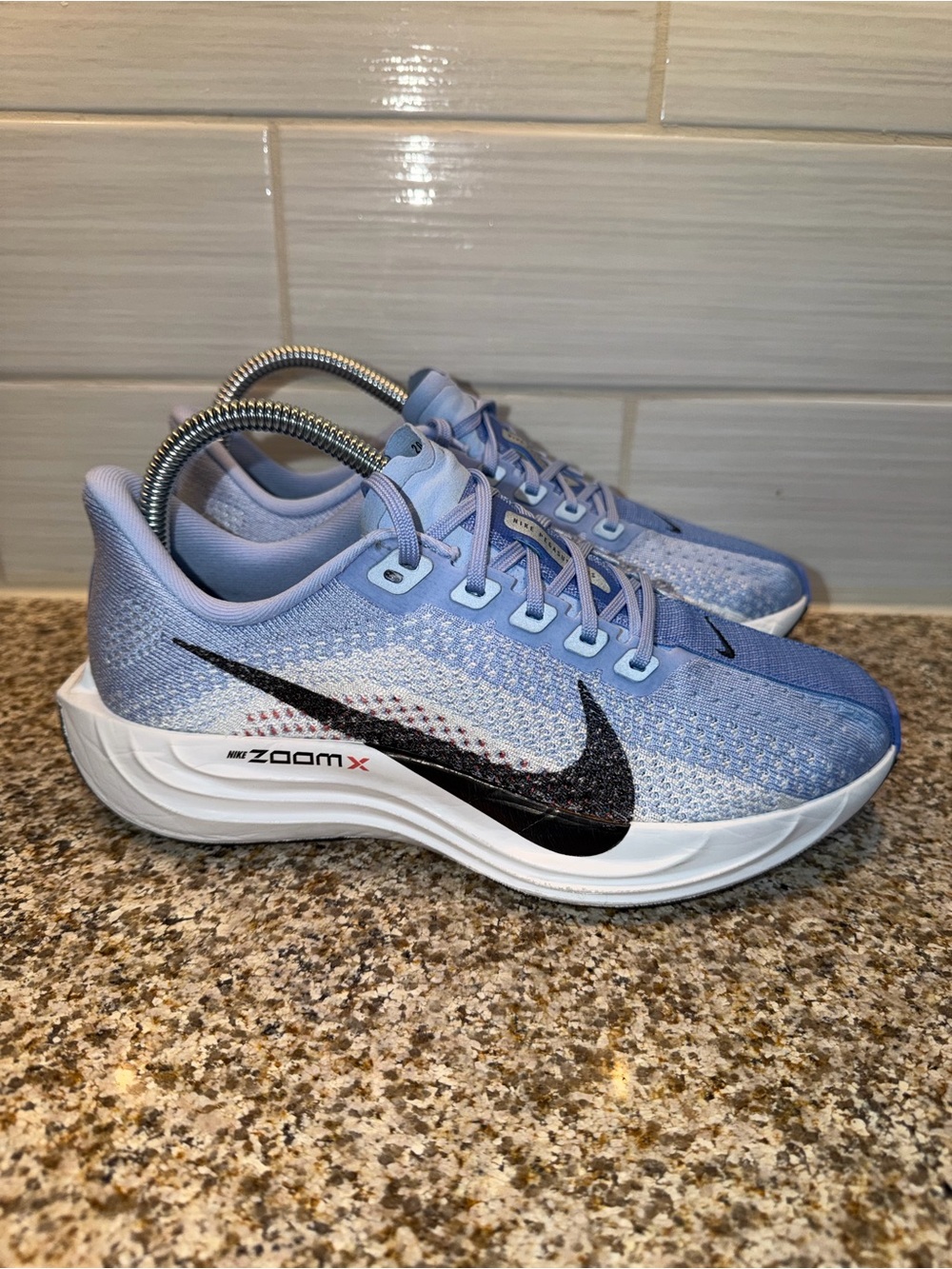 Nike Women’s Light Blue ZoomX Running Sneakers with Black Swoosh